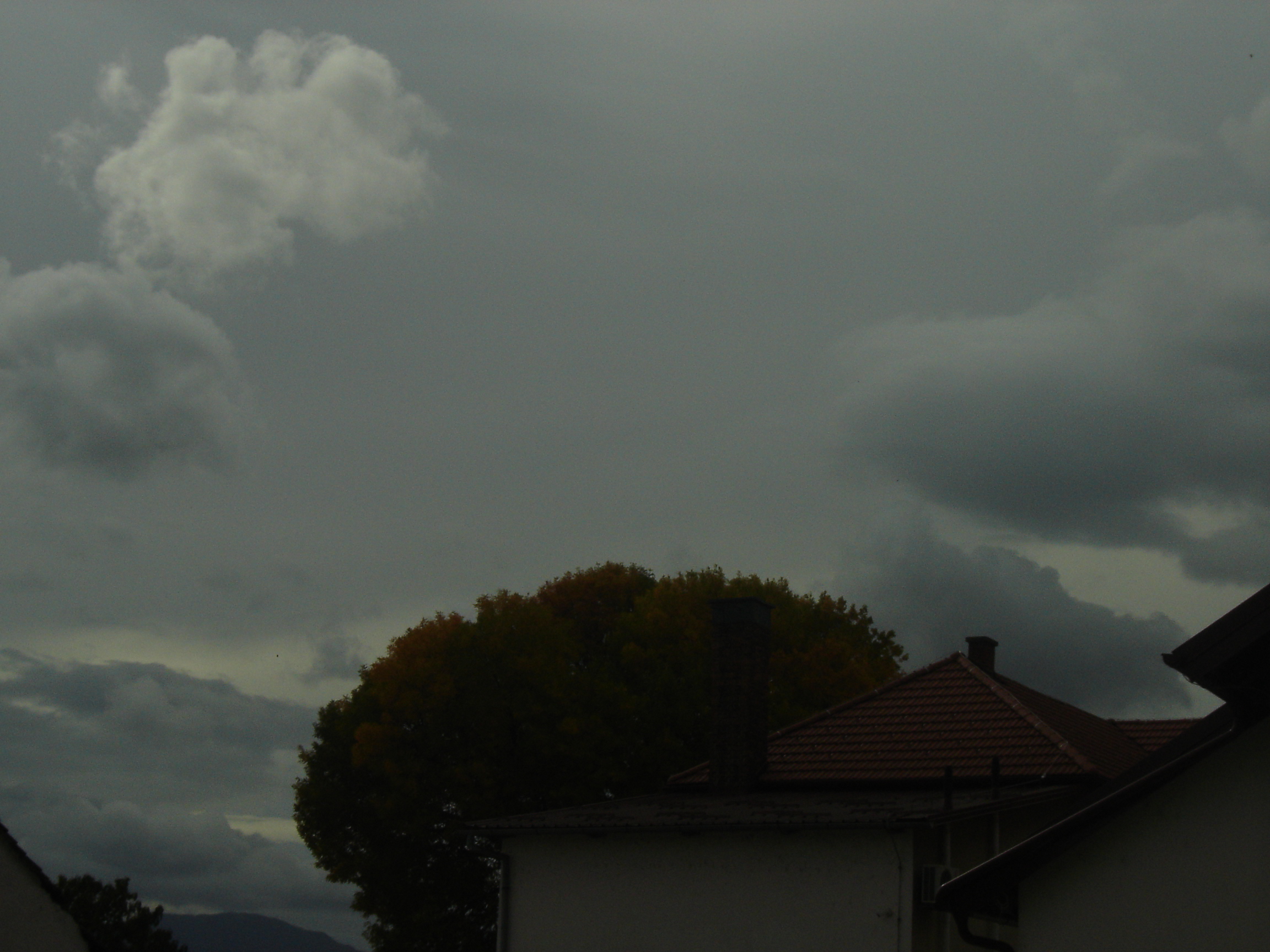 I listen to the dark clouds above